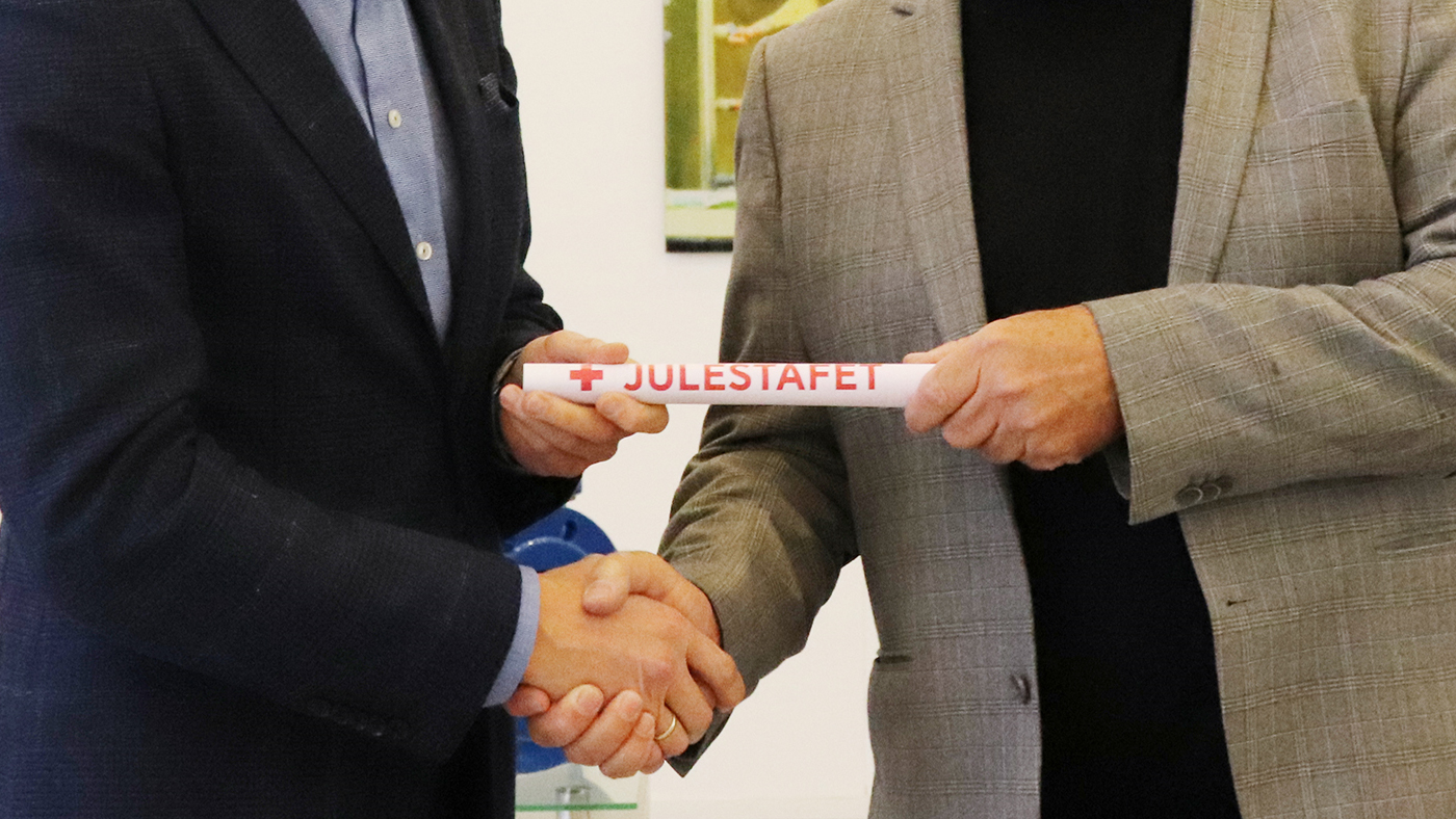 Niels Aage Kjaer happily received the Red Cross Christmas baton