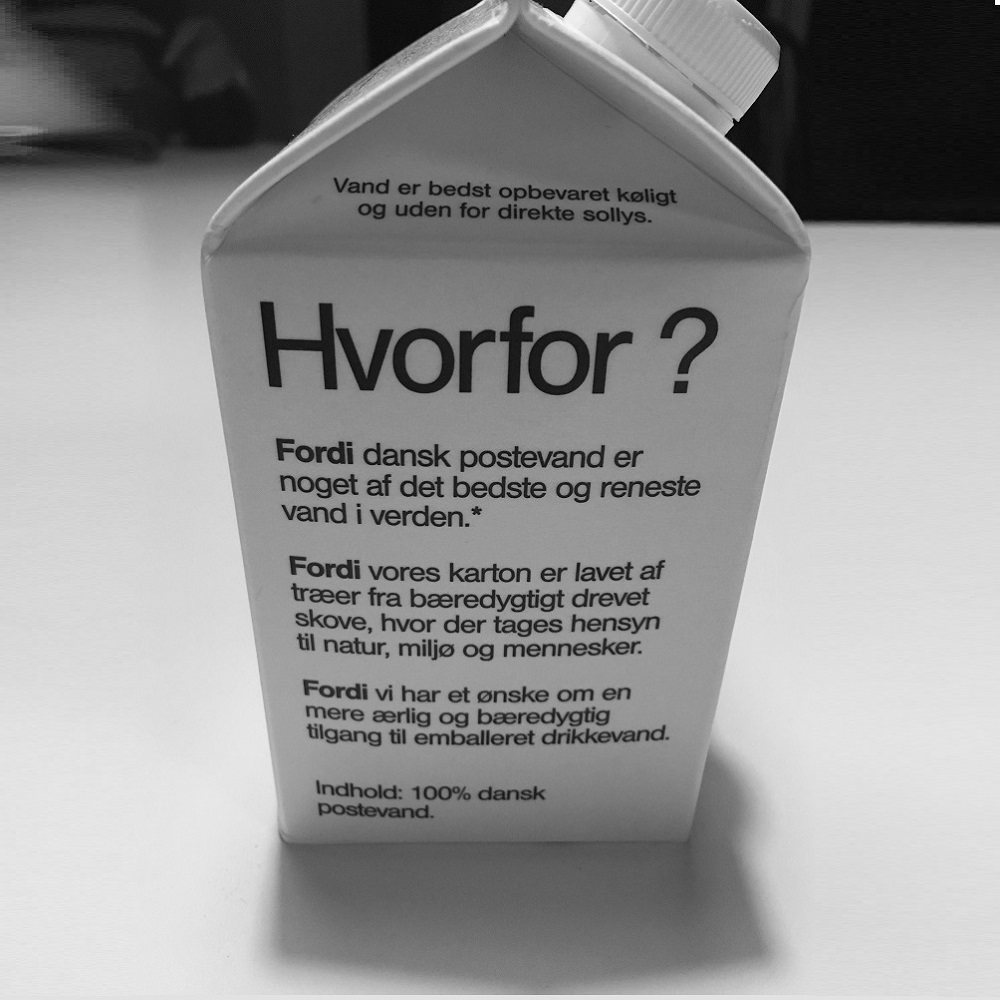 A carton of tap water describing why you should always drink water from the tap if possible.